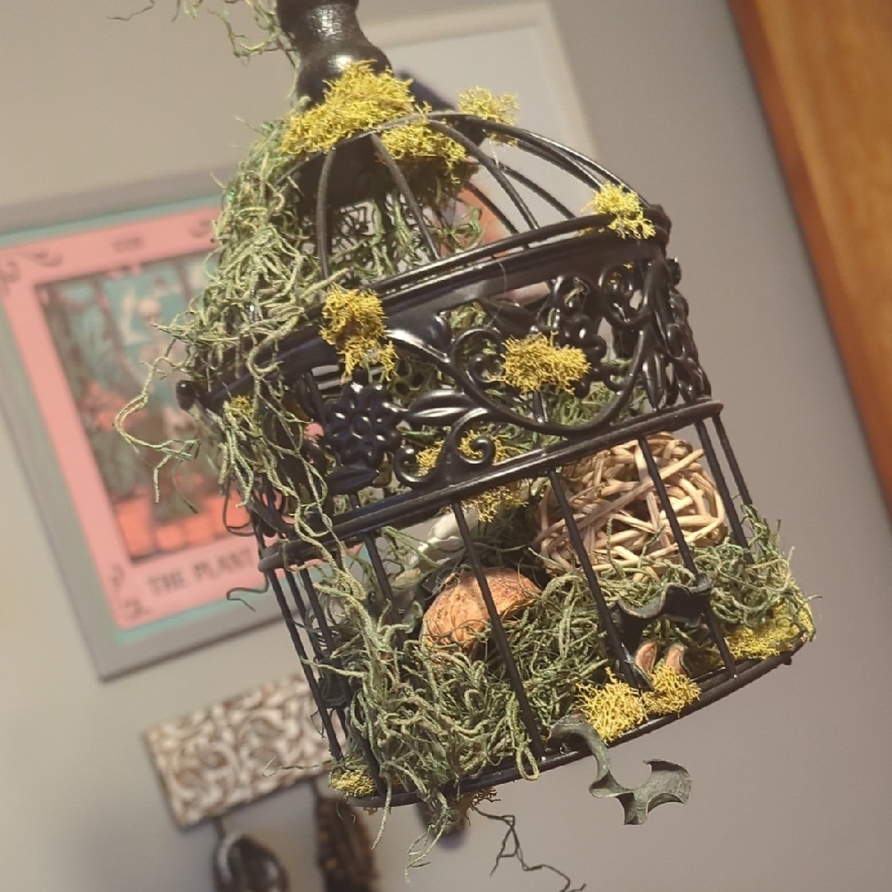 Black Birdcage with Faux Flowers.